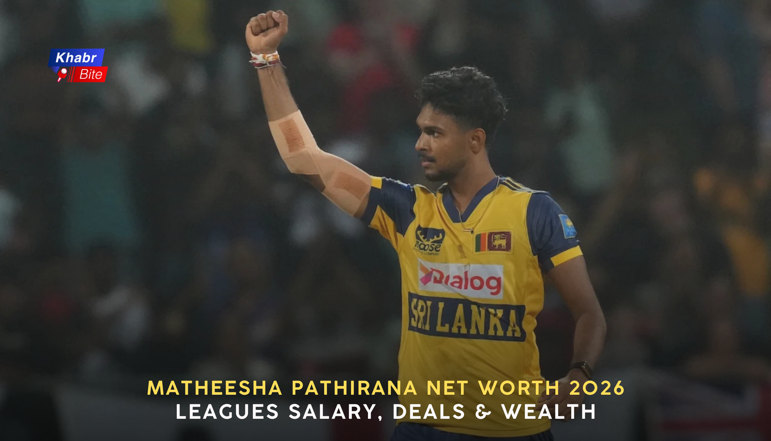 Matheesha Pathirana celebrating a wicket while playing for Sri Lanka, raising his fist during an international T20 match, wearing the yellow Sri Lanka jersey.