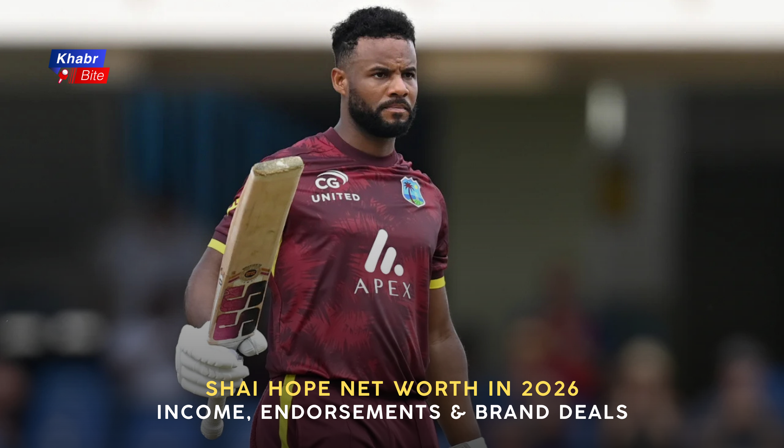 Shai Hope holding a cricket bat during a match, highlighting his net worth in 2026, income sources, endorsements, and brand deals.