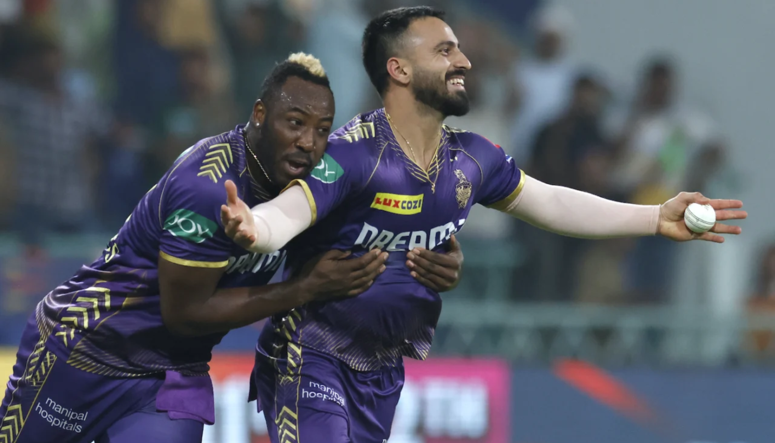 Andre Russell and Ramandeep Singh celebrating a wicket for Kolkata Knight Riders in an IPL match