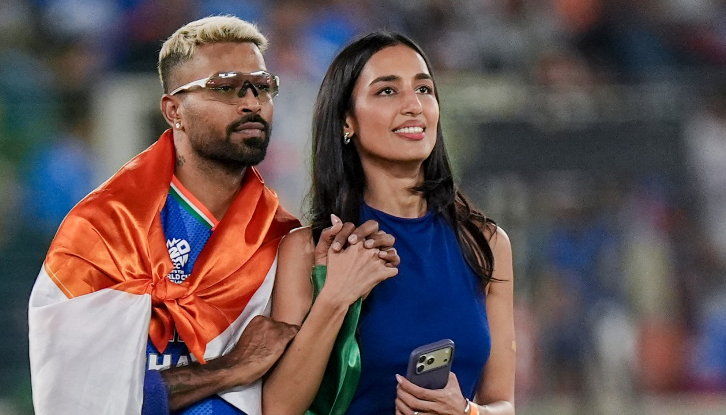 Hardik Pandya wrapped in the Indian tricolour during post-match celebration at the stadium
