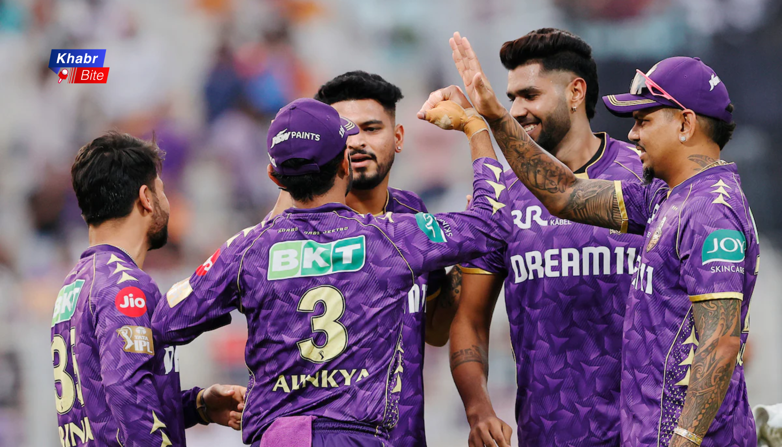Kolkata Knight Riders players celebrating a wicket during IPL match