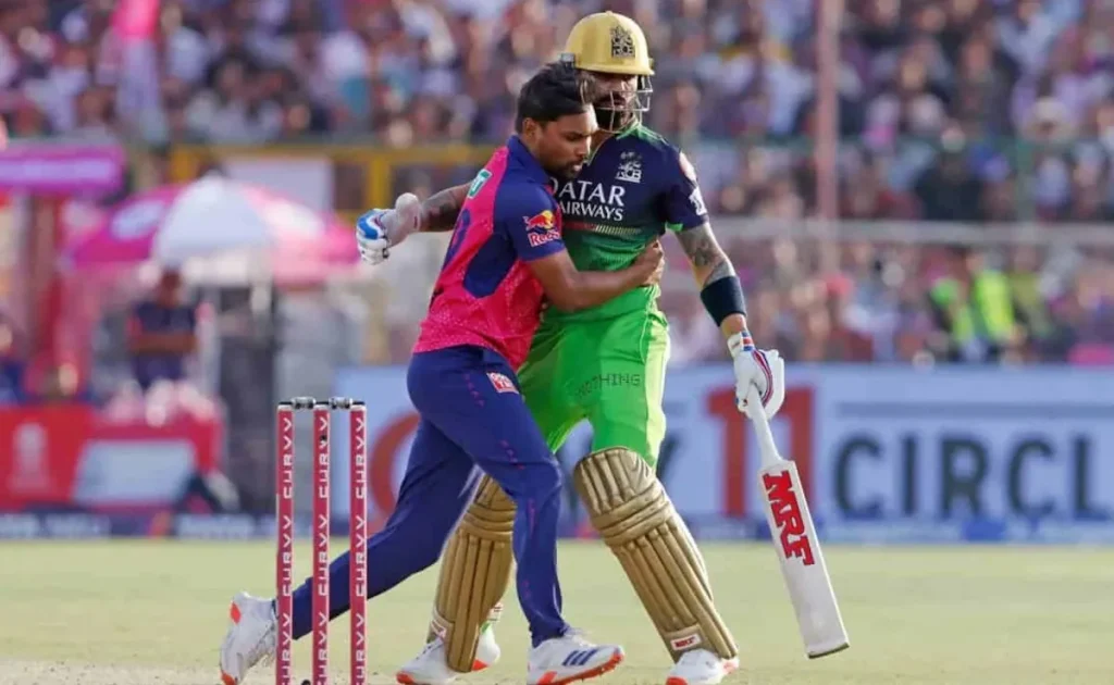 Virat Kohli and Sandeep Sharma  